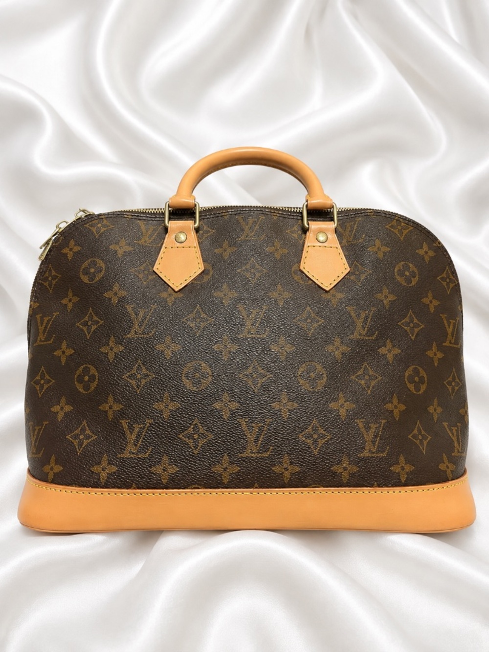 Louis Vuitton Alma PM Monogram Handbag